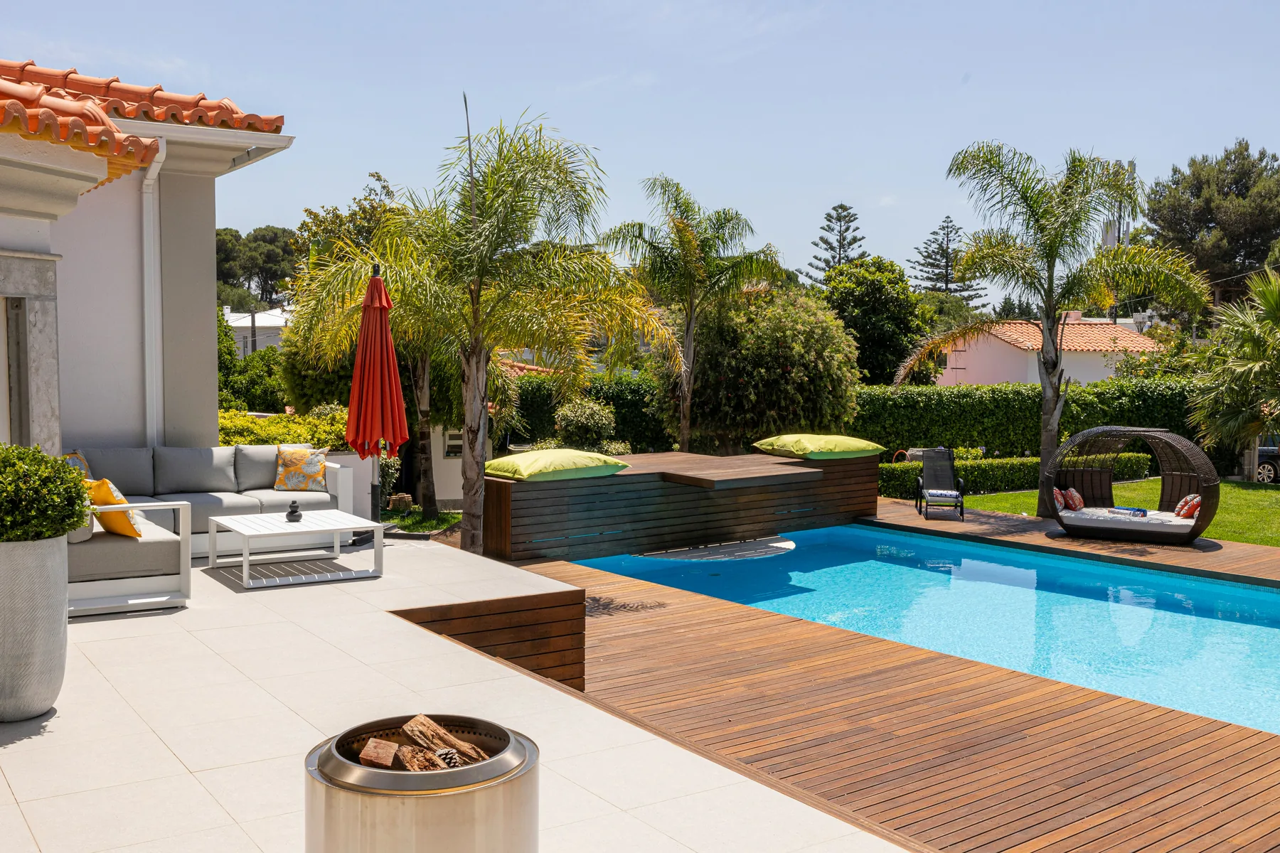 Finished residential landscape with pool and outdoor living space
